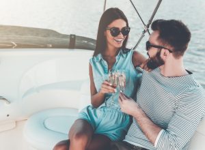 wealthy couple on a boat