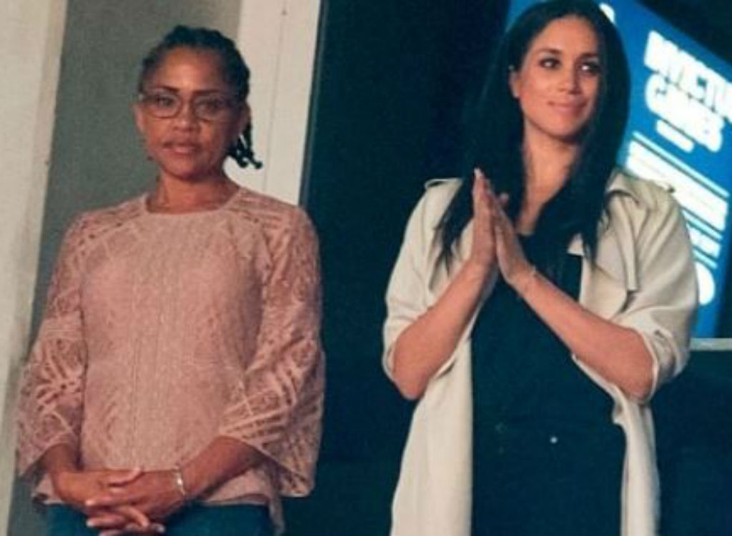 Meghan Markle's mom and Meghan Markle standing next to each other