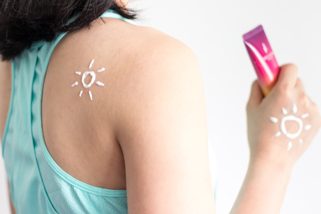 sunscreen application inside Skin Cancer Risks