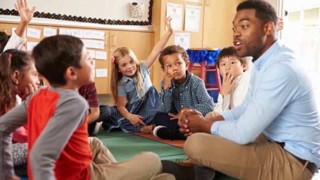 man teaching kid things you should never say to your kid's teacher