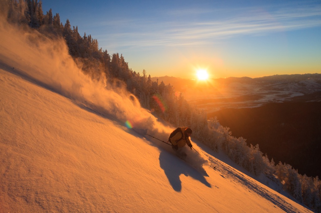 skiing at sunset