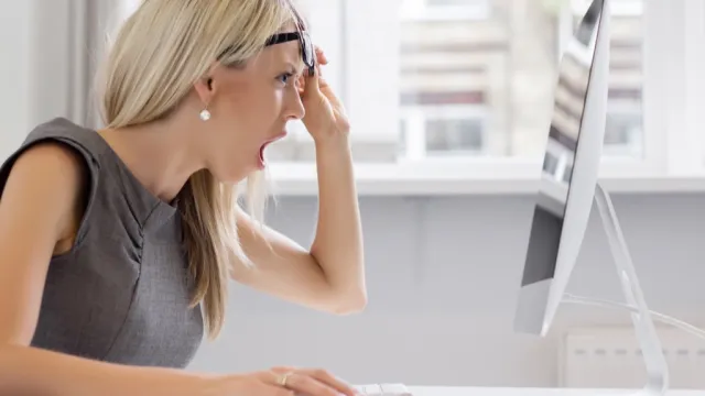 woman shocked on computer
