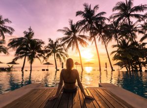woman vacationing by pool