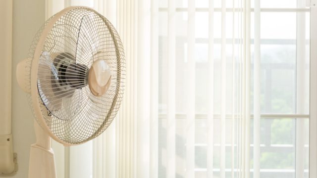 Fan blowing at the window, never use electric fan in summer