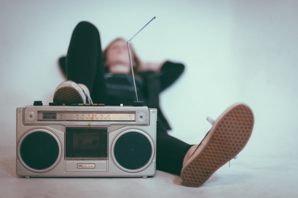 Boombox woman lying down music