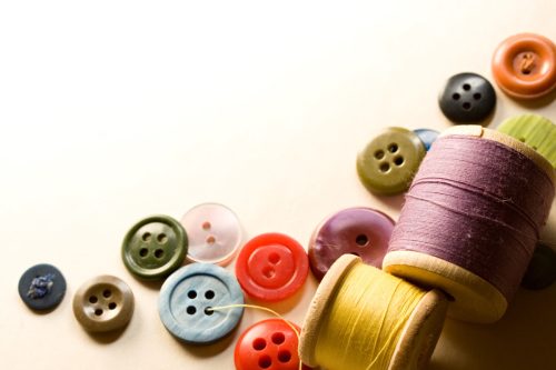 pile of buttons and sewing materials, astonishing facts