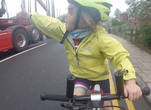 four-year-old Rhoda Jones thanks truck for overtaking her properly while cycling.