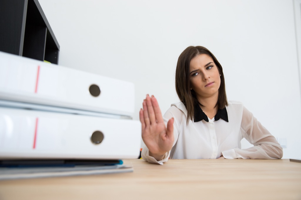 woman saying no to work 40 things you shouldn't believe after 40