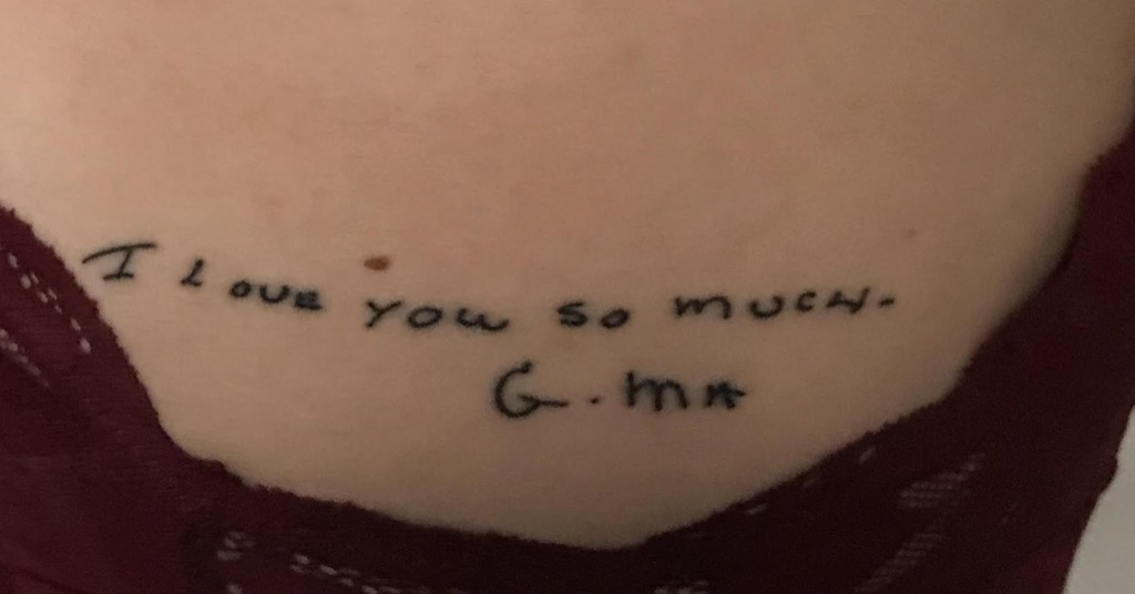 handwriting tattoo on side