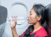 woman drinking water health tweaks over 40