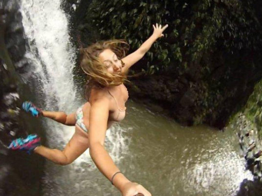 Woman Jumping off Cliff Selfies
