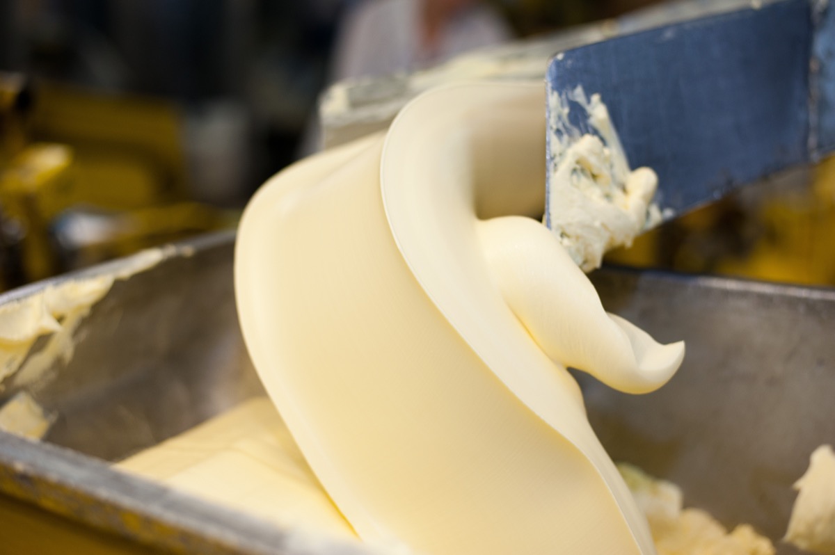 a butter churn churning butter