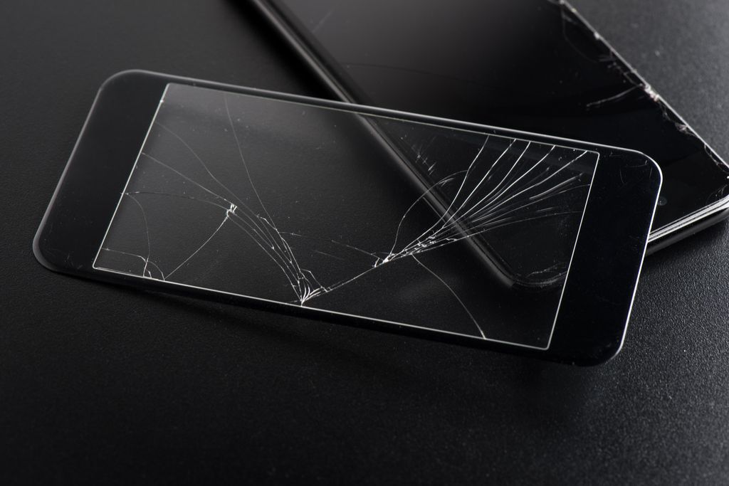 Cracked Screen Protector and Smartphone {Get Rid of Old Stuff}