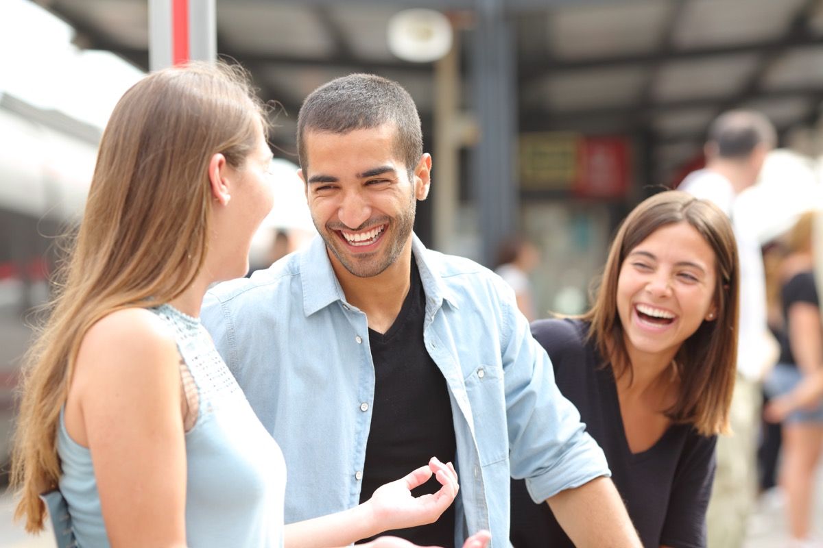 group of people laughing at joke, one liners