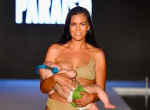 Mara Martin breastfed her five-month-old baby while walking the runway of the Sports Illustrated Swimsuit show on Sunday.