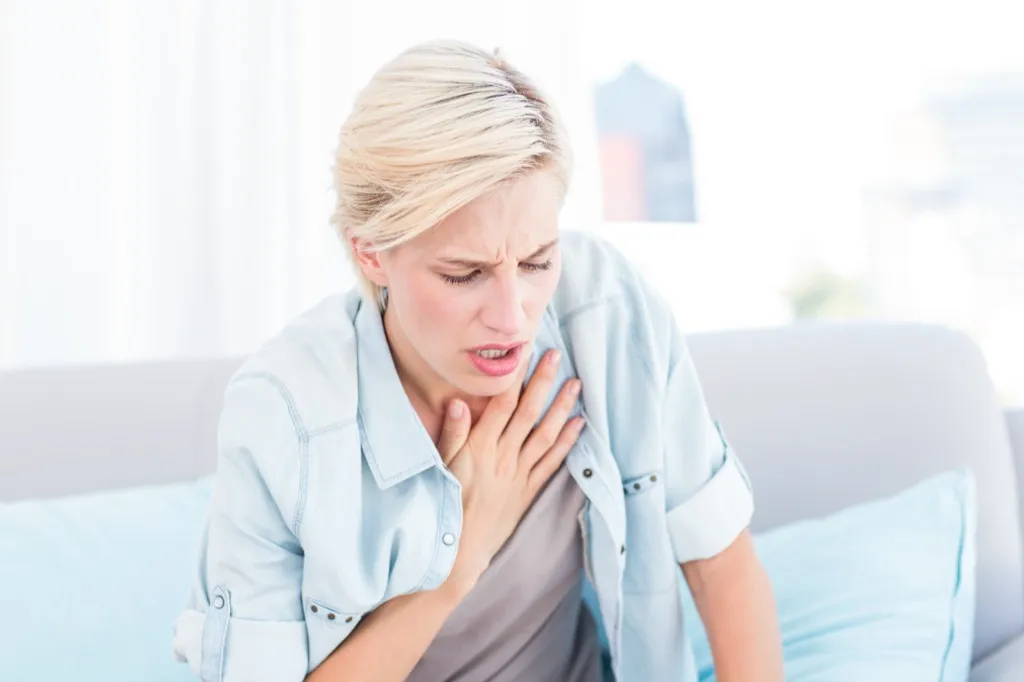Woman with Shortness of Breath Heart Attack Signs