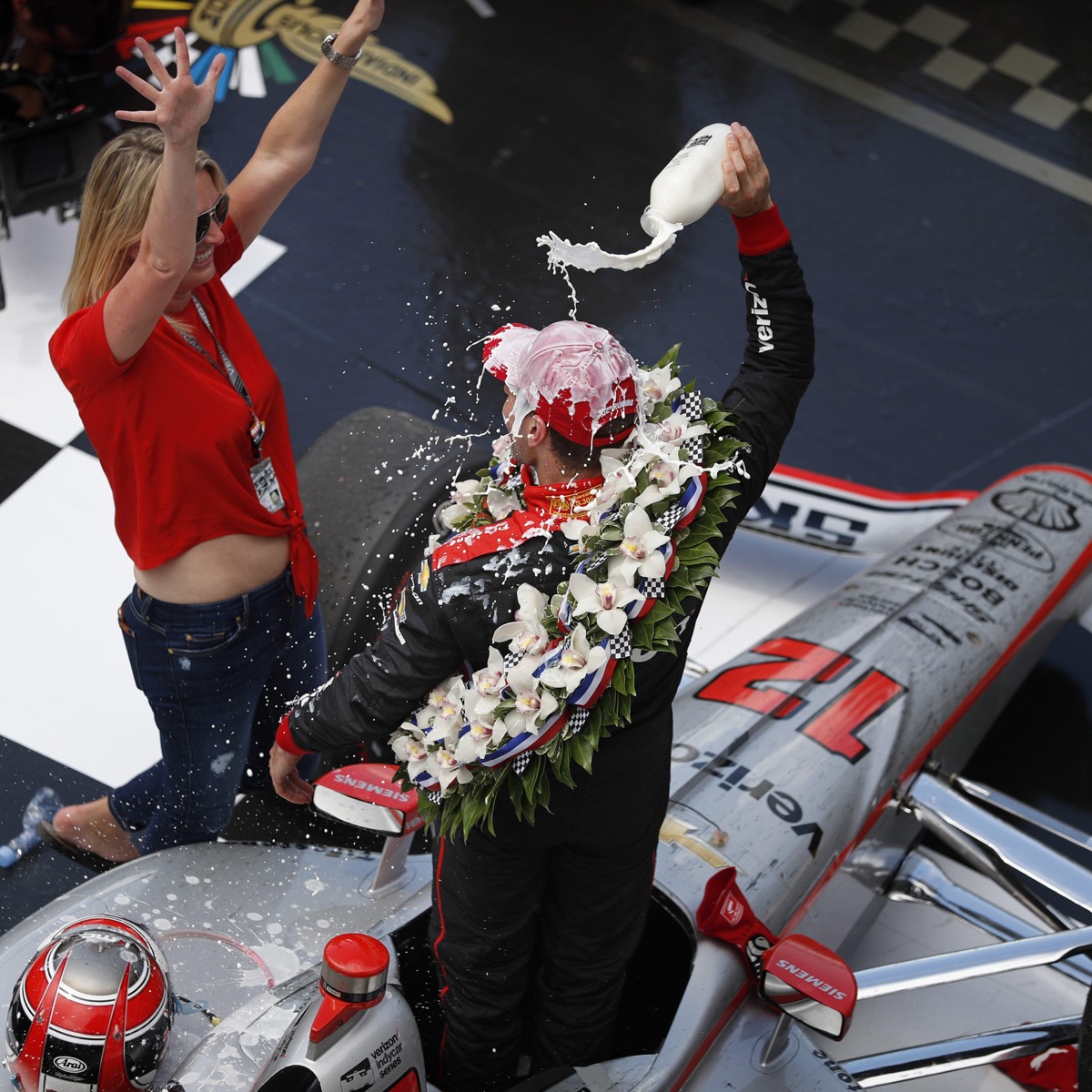 will power gets milk dumped on his head at the 2018 indy 500