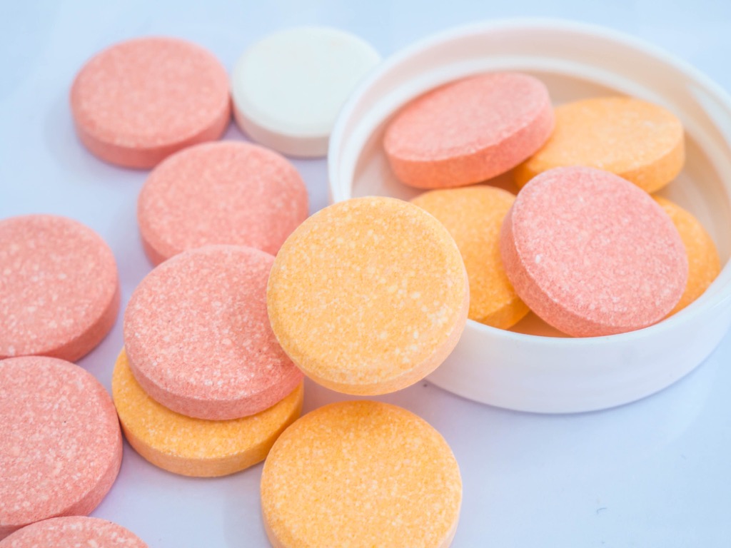 pink and orange antacid tablets