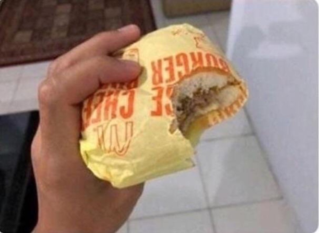 burger with wrapper photos that prove humanity is doomed