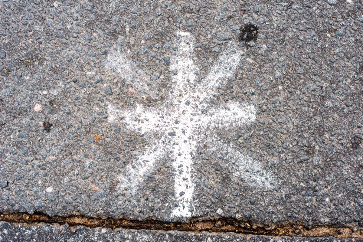 A chalk drawing of an asterisk