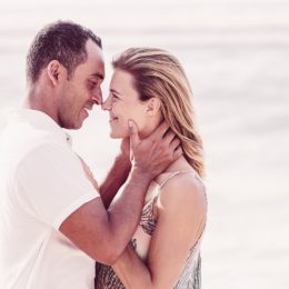 middle aged couple kissing