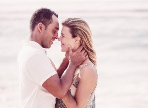 middle aged couple kissing