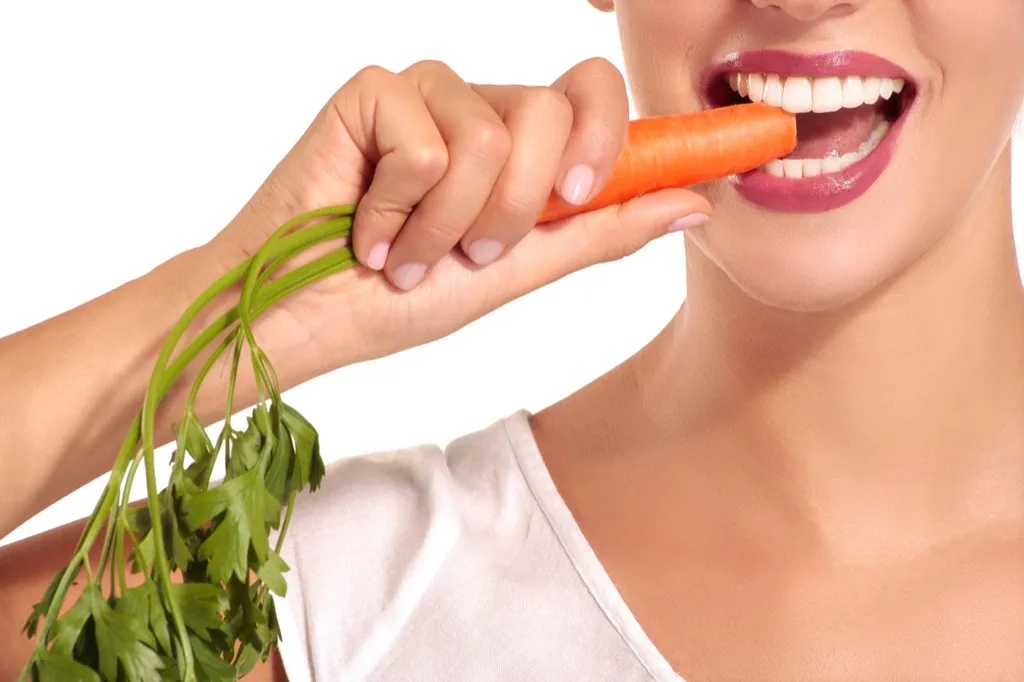 Woman eating carrots, old wives tales