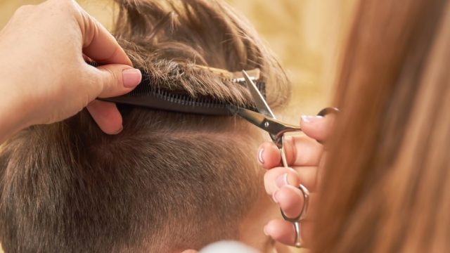 man getting haircut, make yourself more attractive