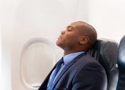 Man sleeping on an airplane