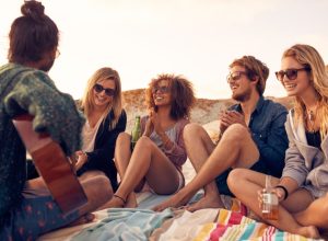 people hanging out on a beach