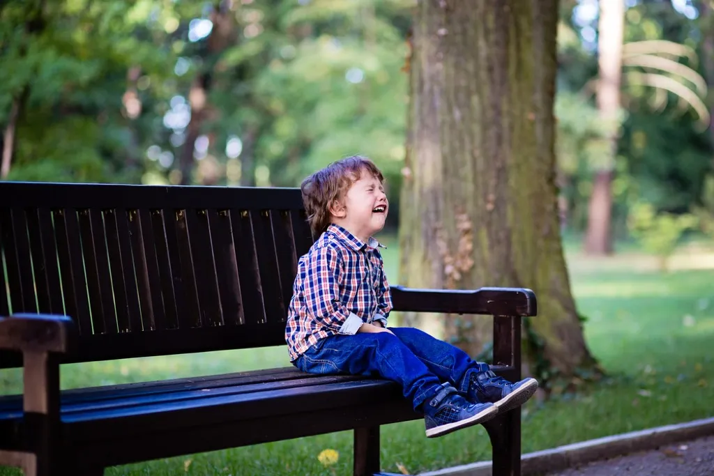 child having tantrum on bench, bad parenting advice