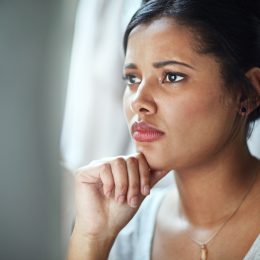 shot of an anxious young businesswoman looking at her computer screen while sitting in the office