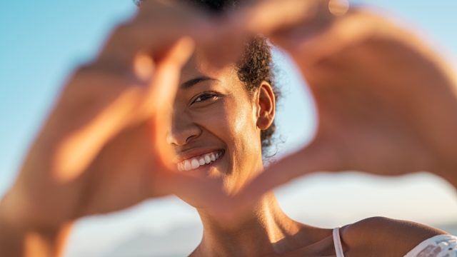 Woman making heart with her hands