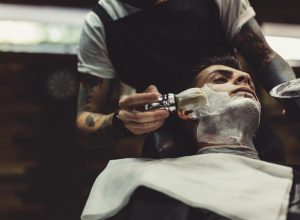 barber man getting shave