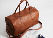 brooks brothers cognac leather duffel bag and 200 anniversary rizzoli book
