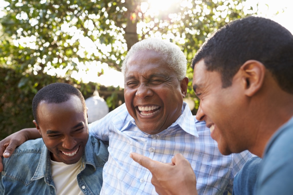 older father laughing with grown sons, laffy taffy jokes 