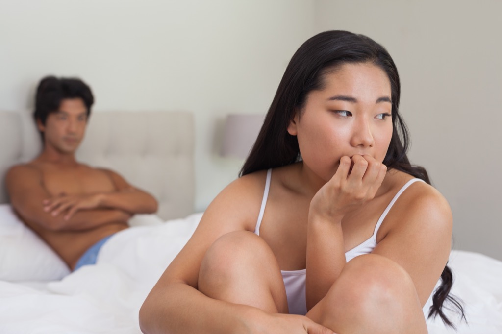 disappointed couple in bed husband mistakes