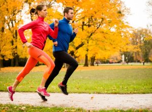 couple running in fall