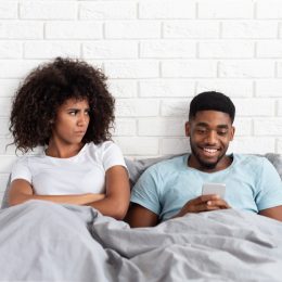 husband texts in bed with wife, annoying things people do