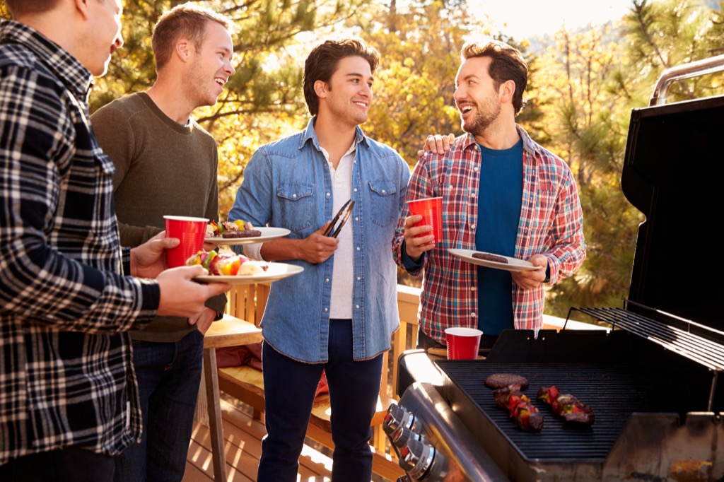 men cooking outdoors