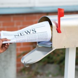 newspaper in mailbox