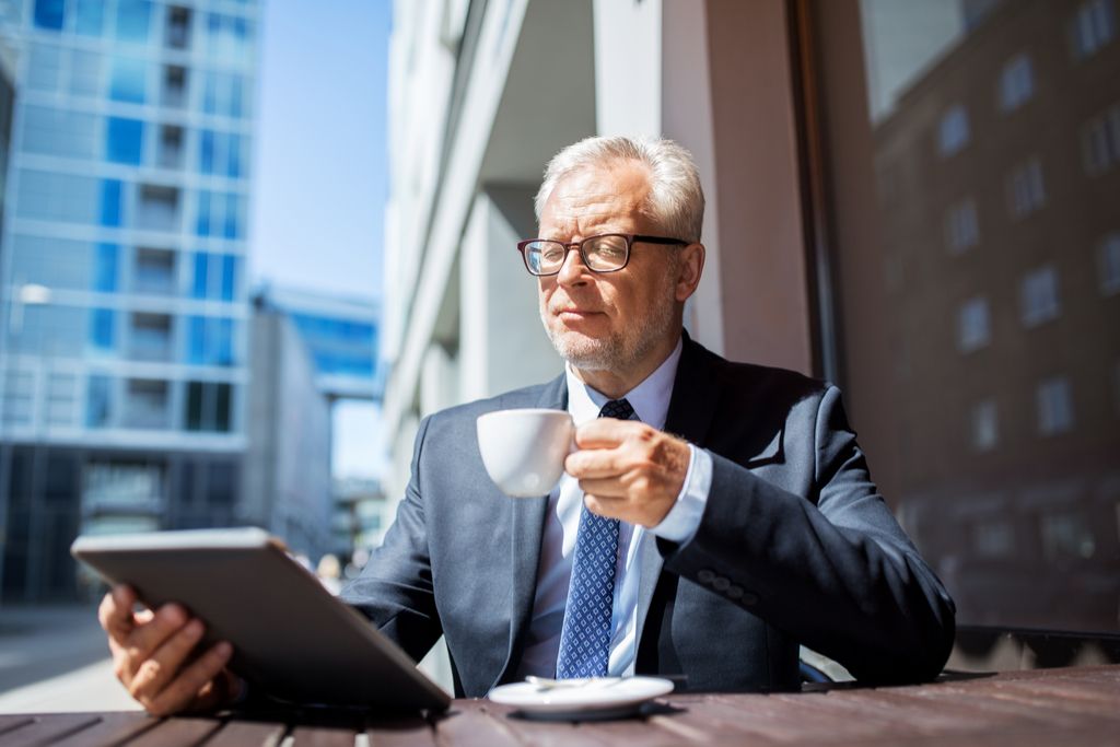 Writing note showing Time To Retire. Business concept for Take the  pensioner status stop working in elderly old enough Businessman in blue  suite stand Stock Photo - Alamy