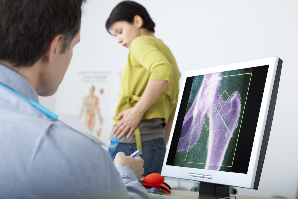 pelvis fracture woman getting examined by doctor x ray surprising symptoms