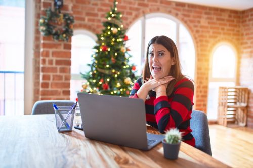 Woman having a panic attack and having trouble breathing on Christmas