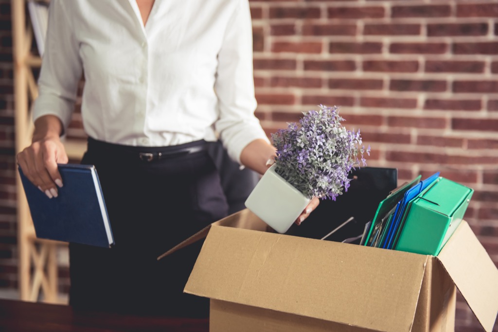 woman getting fired and putting her things in a box habits ruining your heart