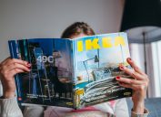 Woman Reading Ikea Catalog Surprising Facts about Ikea