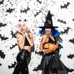 woman dressed in witch costumes for halloween