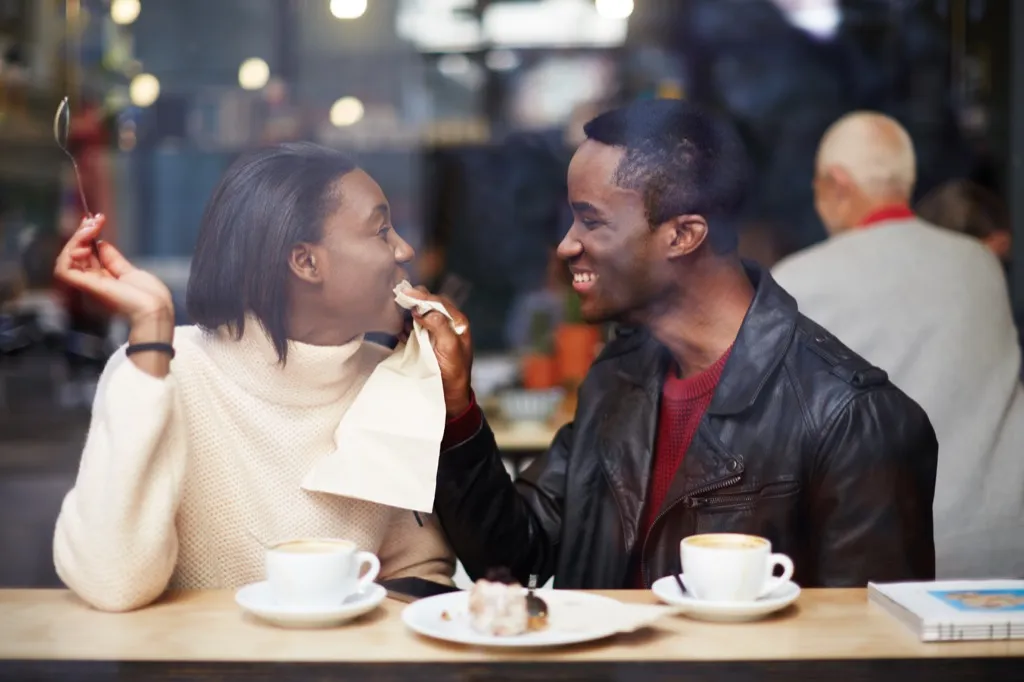 couple on a romantic date in a coffee shop {Small Resolutions}
