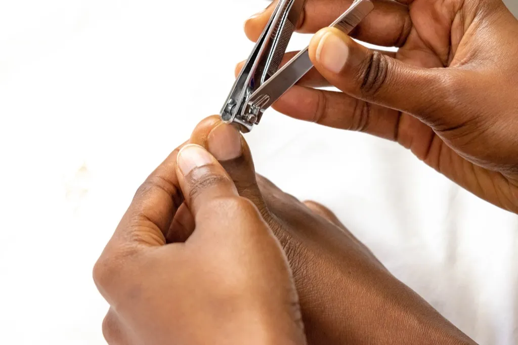 Person clipping nails