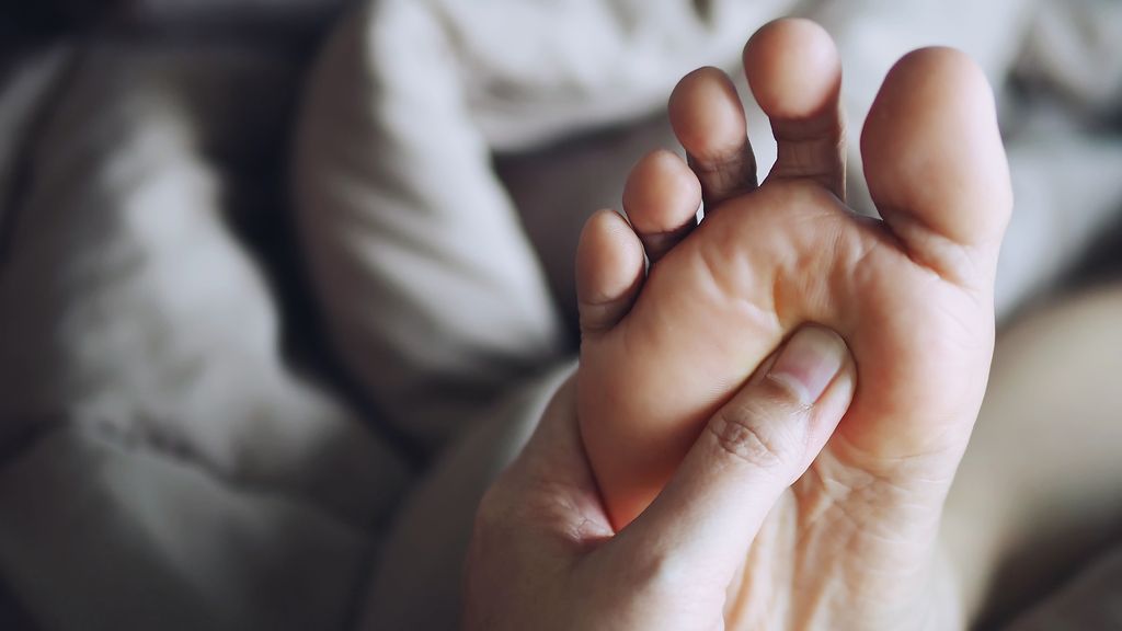 Friend Giving Foot Massage 